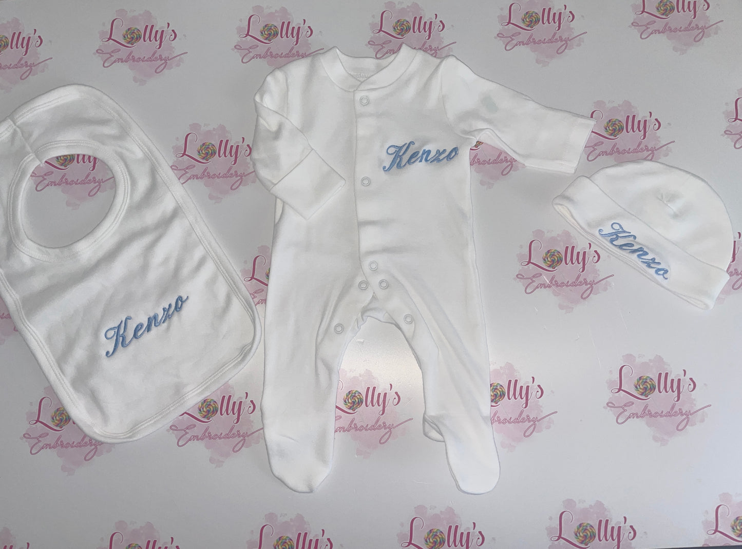 Babygrow and bib set